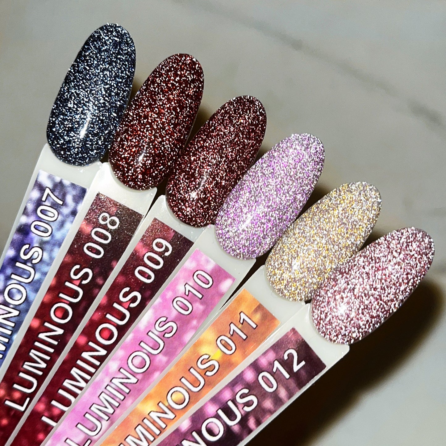Komilfo Luminous Collection L009 (wine, reflective), 8 ml